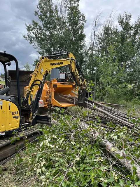 Forestry mulcher clearing understory brush during a fuel reduction job in North Idaho